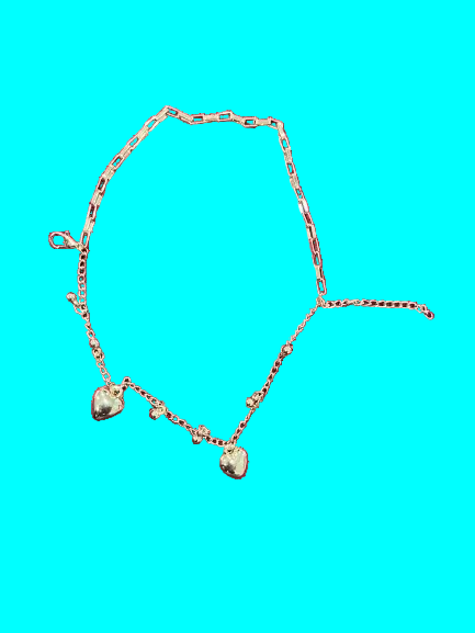 A delicate rose gold chain necklace with two small dangling heart charms, photographed on a solid white background.